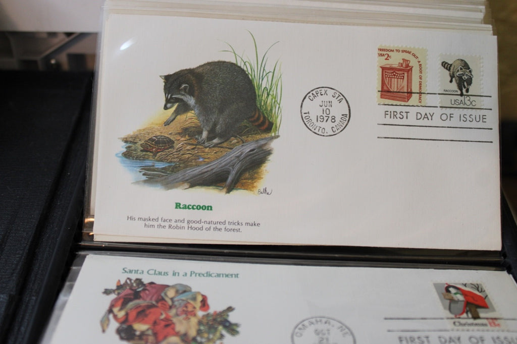 Professional album with 100, 1st Day of Issue and Other Commemorative Covers.14