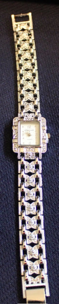Ladies Glitzie Watch! Dainty sparkling all over A good time piece! W/new battery0