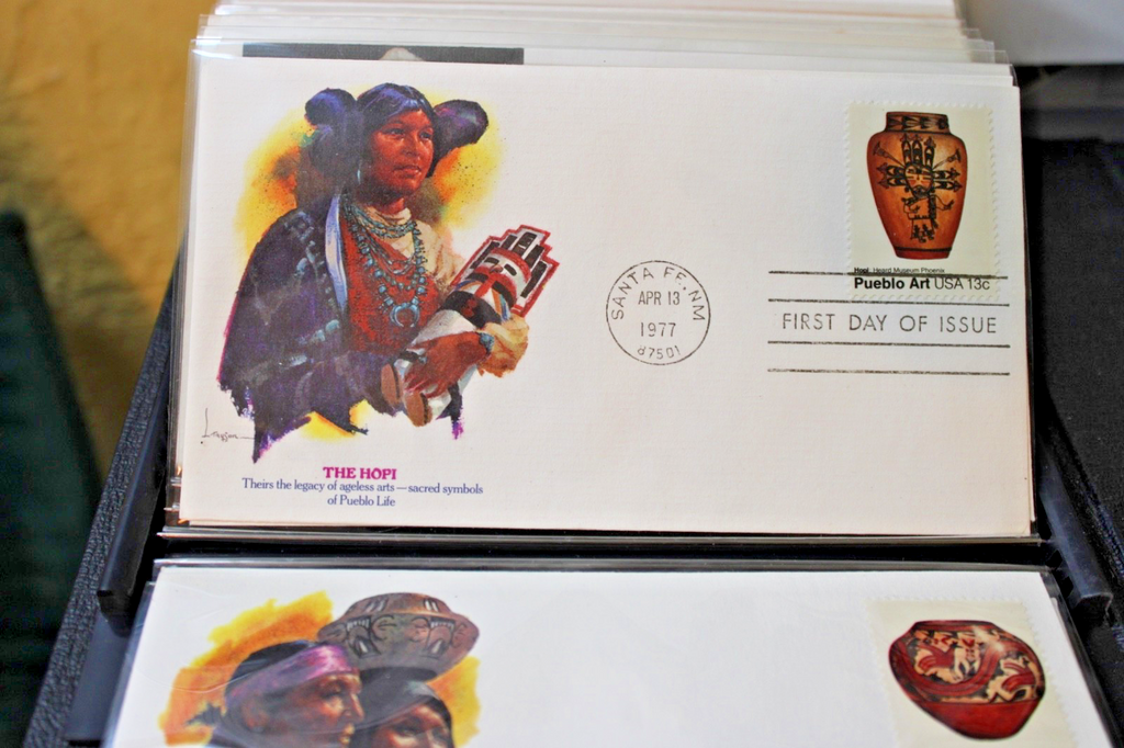 Professional album with 100, 1st Day of Issue and Other Commemorative Covers.13